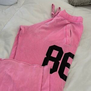 VS PINK Jogger Pants with Black Number Print in distressed pink